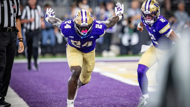 Adam Mohammad celebrates his first UW touchdown.
