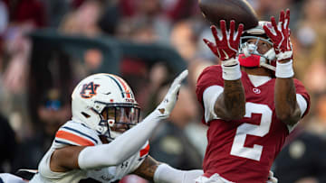 Alabama Crimson Tide wide receiver Ryan Williams (2) drops a pass guarded by Auburn Tigers defensive back Jay Crawford (23) as Auburn Tigers take on Alabama Crimson Tide at Bryant-Denny Stadium in Tuscaloosa, Ala., on Saturday, Nov. 30, 2024. Alabama Crimson Tide leads Auburn Tigers 14-6 at halftime.