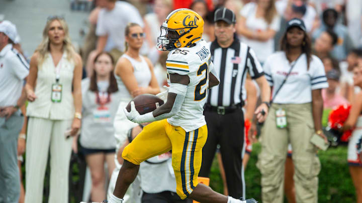 Cal's Jaivian Thomas sprints to the end zone at Auburn.