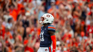 Auburn Tigers wide receiver Malcolm Simmons (11) celebrates his touchdown catch as Auburn Tigers take on Oklahoma Sooners at Jordan-Hare Stadium in Auburn, Ala., on Saturday, Sept. 28, 2024. Auburn Tigers lead Oklahoma Sooners 14-7 at halftime.