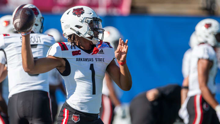 Arkansas State Red Wolves quarterback Jaylen Raynor (1) warms up before Arkansas State Red Wolves take on the Northern Illinois Huskies during the Camellia Bowl at Cramton Bowl in Montgomery, Ala., on Saturday, Dec. 23, 2023.