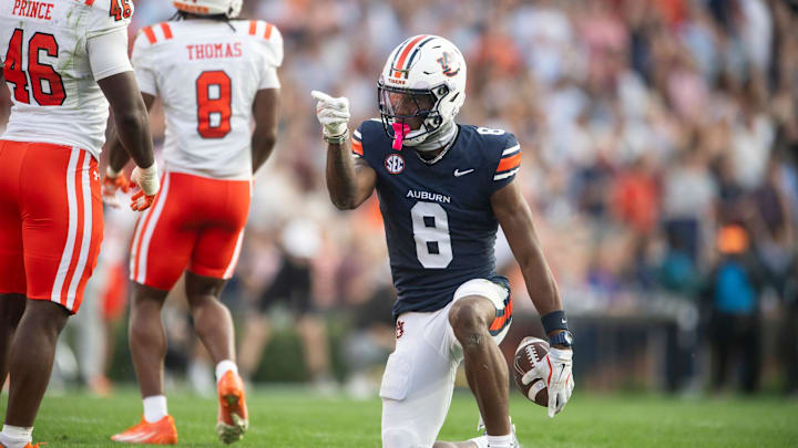 Auburn Tigers wide receiver Cam Coleman (8) celebrates a first down as Auburn Tigers take on Mercer Bears at Jordan-Hare Stadium in Auburn, Ala. on Saturday, Nov. 22, 2025. Auburn Tigers defeated the Mercer Bears 62-17.