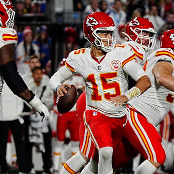 Bills Greg Rousseau follows Kansas City quarterback Patrick Mahomes while the offensive line tries to keep Rousseau away from Mahomes during second half action against the Kansas City Chiefs in Orchard Park, Nov.17, 2024.