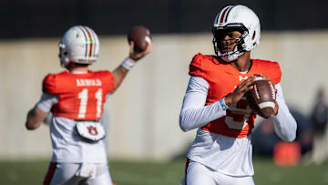 Auburn Tigers quarterback Jackson Arnold (11) and Deuce Knight (9).