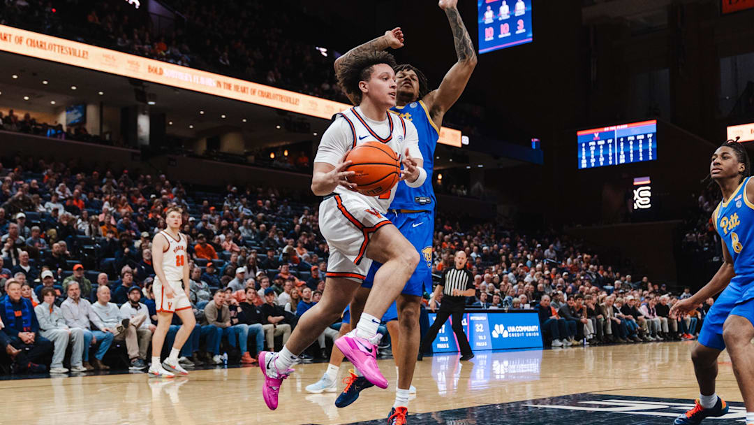 Virginia Cavaliers guard Chance Mallory (2) passes the ball in the second half against the Pittsburgh Panthers.