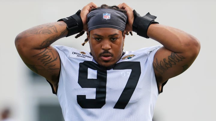 Jacksonville Jaguars defensive end Andre Carter (97) prepares to sprint during the third day of an NFL football training camp practice Friday, July 26, 2024 at EverBank Stadium’s Miller Electric Center in Jacksonville, Fla.