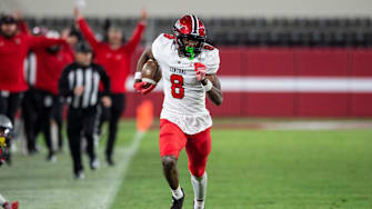 Central Phenix City's Cameron Coleman (8) breaks free for a touchdown after a catch as Central Phenix City faces Thompson in the Class 7A football state championship at Bryant-Denny Stadium in Tuscaloosa, Ala., on Wednesday, Dec. 6, 2023. Central Phenix City defeated Thompson 21-19.