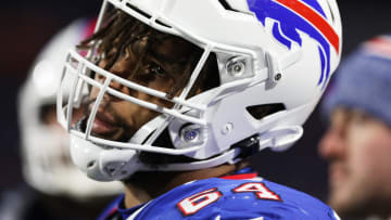 Bills O'Cyrus Torrence looks up at the large screen as the Chiefs run out the clock to move on in the division playoffs.