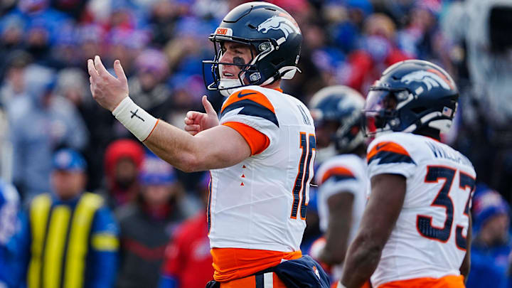 Denver Broncos quarterback Bo Nix (10) signals to the players before the snap during the first half of the Buffalo Bills wild card game against the Denver Broncos at Highmark Stadium in Orchard Park on Jan. 12, 2025.