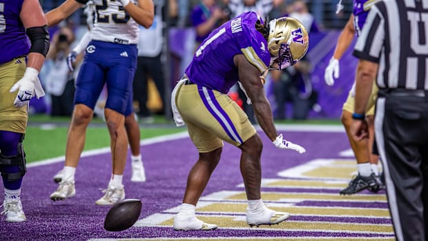 Jonan Coleman breaks into a post-touchdown pose. 