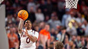 Auburn Tigers guard Tahaad Pettiford (0) goes up for a layup as Auburn Tigers take on Purdue Boilermakers at Legacy Arena in Birmingham, Ala., on Saturday, Dec. 21, 2024. Auburn Tigers lead Purdue Boilermakers 41-26 at halftime.