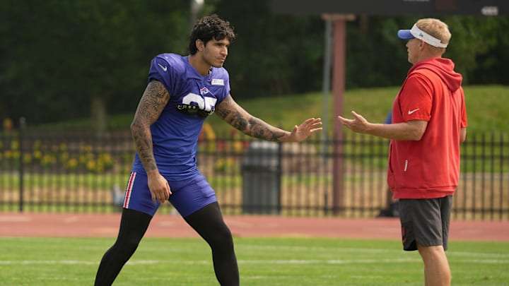 Buffalo Bills linebacker Jimmy Ciarlo stays after practice for advice from special teams coordinator Chris Tabor at Bills Training Camp at St. John Fisher University in Pittsford on Aug.6, 2025. Buffalo Bills linebacker Jimmy Ciarlo stays after practice for advice from special teams coordinator Chris Tabor at Bills Training Camp at St. John Fisher University in Pittsford on Aug.6, 2025.