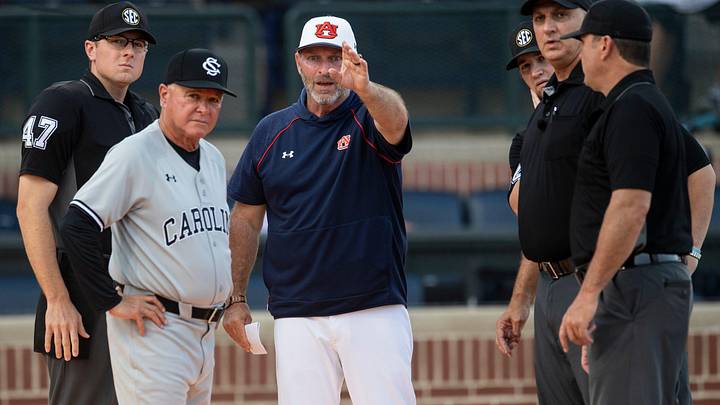 South Carolina Gamecocks head coach Paul Mainieri and Auburn Tigers head coach Butch Thompson talk with officials before the game as the Auburn Tigers take on South Carolina Gamecocks at Plainsman Park in Auburn, Ala., on Thursday, May 8, 2025.