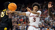 Auburn forward Jahki Howard (3) passes the ball against the Missouri Tigers in January.