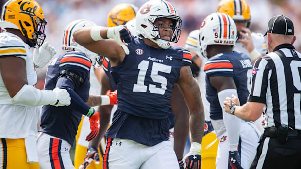 Keldric Faulk (15) celebrates a stop as Auburn Tigers take on California Golden Bears