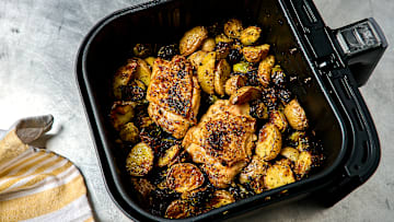 Air Fryer chicken thighs with potatoes and Brussels sprouts