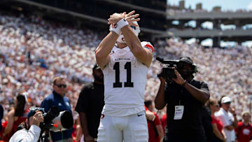 Auburn Tigers quarterback Jackson Arnold (11) celebrates his touchdown run as Auburn Tigers take on South Alabama Jaguars at Jordan-Hare Stadium in Auburn, Ala. on Saturday, Sept. 13, 2025. Auburn Tigers lead South Alabama Jaguars 28-9 at halftime.
