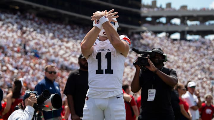 Auburn Tigers quarterback Jackson Arnold (11) celebrates his touchdown run as Auburn Tigers take on South Alabama Jaguars at Jordan-Hare Stadium in Auburn, Ala. on Saturday, Sept. 13, 2025. Auburn Tigers lead South Alabama Jaguars 28-9 at halftime.