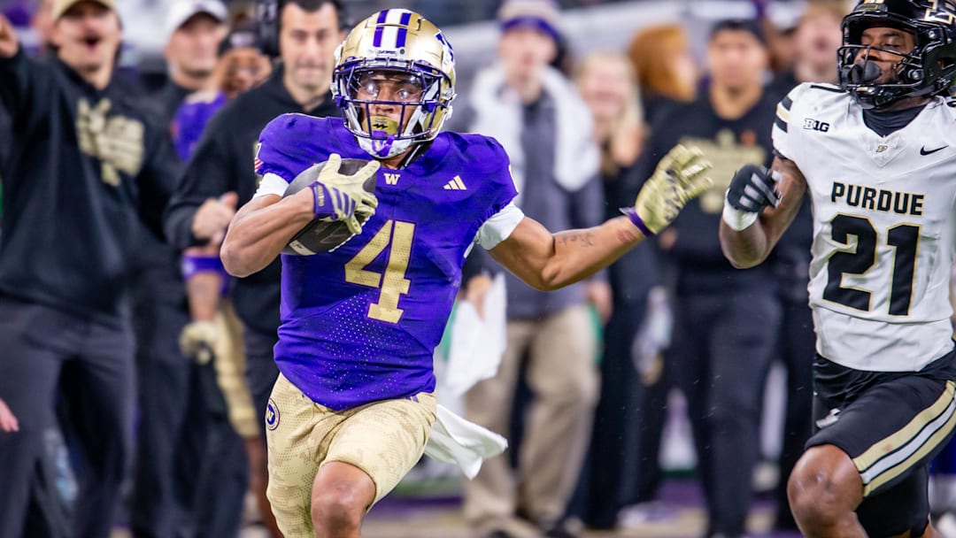 Jordan Washington breaks away from Purdue on a 68-yard scoring run.  