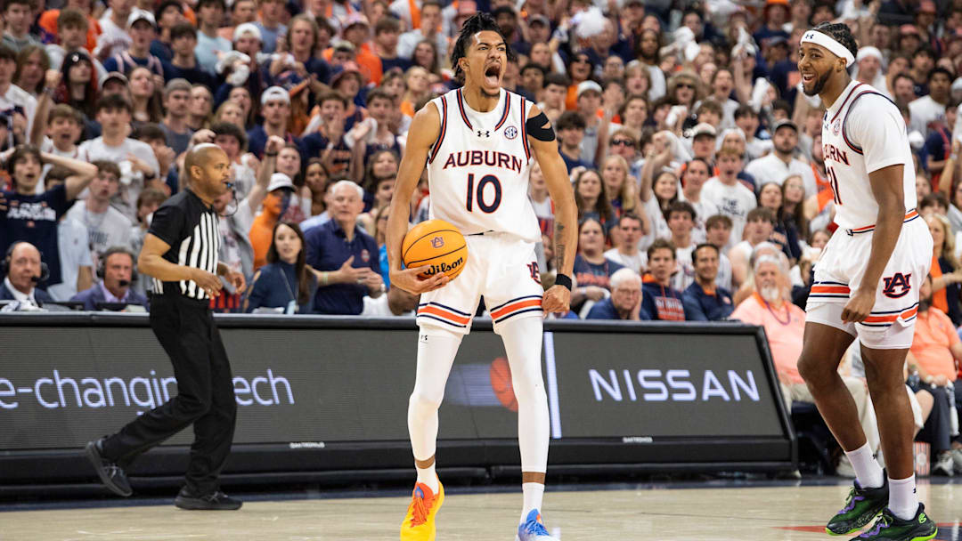 Auburn Tigers forward Chad Baker-Mazara (10) celebrates after drawing a foul as Auburn Tigers take on Alabama Crimson Tide at Neville Arena in Auburn, Ala., on Saturday, March 8, 2025.