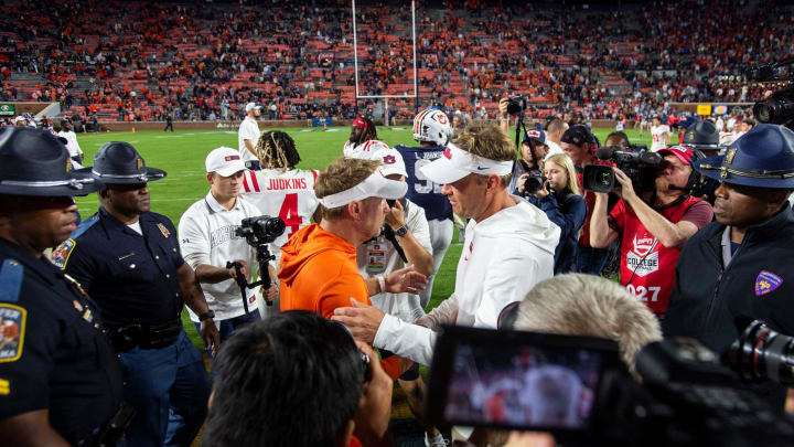 Auburn Tigers head coach Hugh Freeze and Mississippi Rebels head coach Lane Kiffin shake hands after the game as Auburn Tigers take on Mississippi Rebels at Jordan-Hare Stadium in Auburn, Ala., on Saturday, Oct. 21, 2023. Mississippi Rebels defeated Auburn Tigers 28-21.