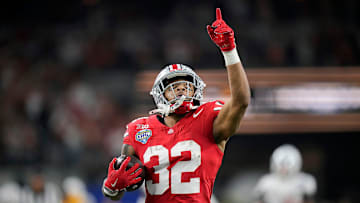 Ohio State Buckeyes running back TreVeyon Henderson (32) scores a touchdown on a 75-yard touchdown catch and run against Texas Longhorns in the second quarter of the Cotton Bowl Classic during the College Football Playoff semifinal game at AT&T Stadium in Arlington, Texas on January, 10, 2025.