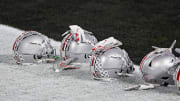 Jan. 11, 2021; Miami Gardens, Florida, USA; Ohio State Buckeye helmets along the end zone during warm-ups before the College Football Playoff National Championship between the Alabama Crimson Tide and the Ohio State Buckeyes at Hard Rock Stadium in Miami Gardens, Fla. on January 11, 2021.

Ncaa Football Cfp National Championship Ohio State Vs Alabama
