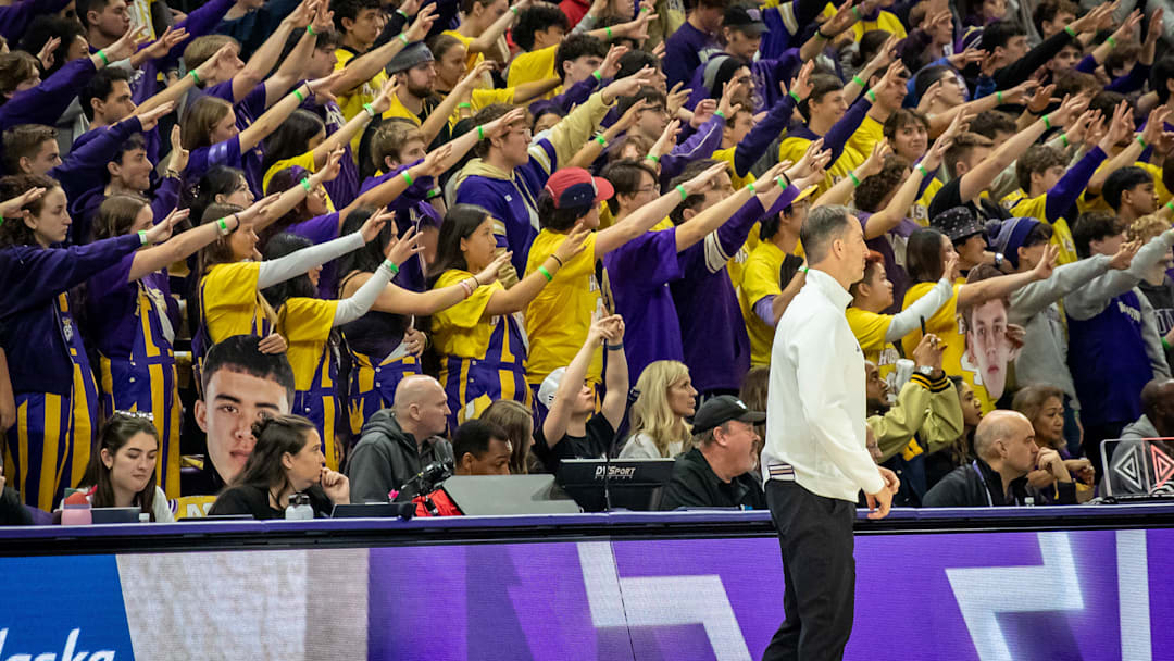 Danny Sprinkle is backed by an energetic student section for the UW-Ohio State game. 