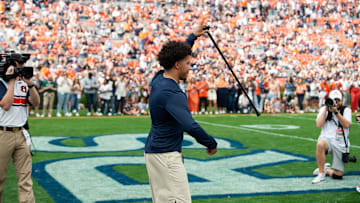 Auburn Tigers running back Brian Battie is honored during a senior day ceremony before Auburn Tigers take on Mercer Bears at Jordan-Hare Stadium in Auburn, Ala. on Saturday, Nov. 22, 2025.