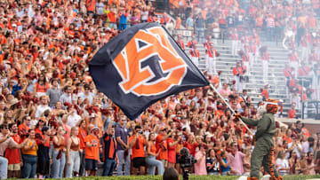 Aubie waves a flag before the game as Auburn Tigers take on Mississippi State Bulldogs at Jordan-Hare Stadium in Auburn, Ala., on Saturday, Oct. 28, 2023. Auburn Tigers defeated Mississippi State Bulldogs 27-13.