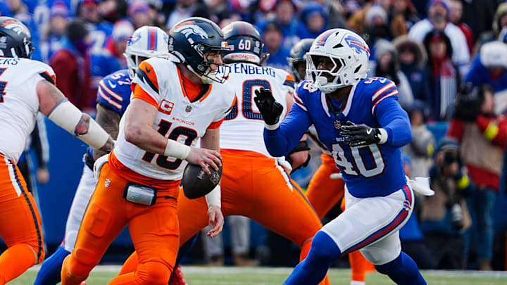 Buffalo Bills linebacker Von Miller (40) rushes towards Denver Broncos quarterback Bo Nix (10) and misses tackling him during the second half of the Buffalo Bills wild card game Buffalo Bills linebacker Von Miller (40) rushes towards Denver Broncos quarterback Bo Nix (10) and misses tackling him during the second half of the Buffalo Bills wild card game