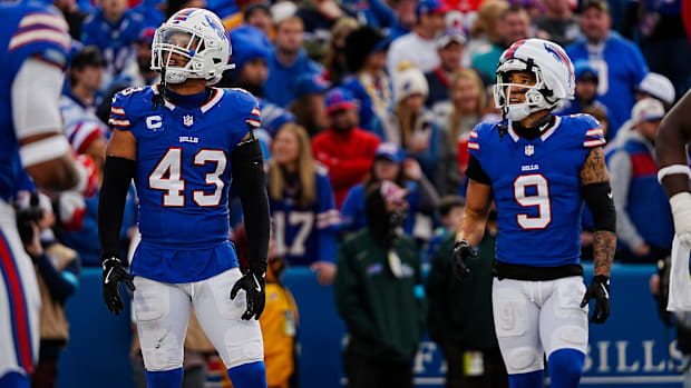 Bills Terrel Bernard and Tyler Rapp (9) look at the score being tied after Miami scored a touchdown late in fourth quarter.