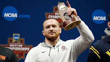 Ohio State's Kyle Snyder (285) celebrates beating Michigan's Adam Conn to win the 285 finals during the 2018 NCAA Division I Wrestling Championships at Quicken Loans Arena in Cleveland, Ohio on March 17, 2018.