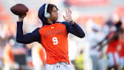 Auburn Tigers quarterback Robby Ashford (9) warms up before Auburn Tigers take on New Mexico State Aggies at Jordan-Hare Stadium in Auburn, Ala., on Saturday, Nov. 18, 2023.