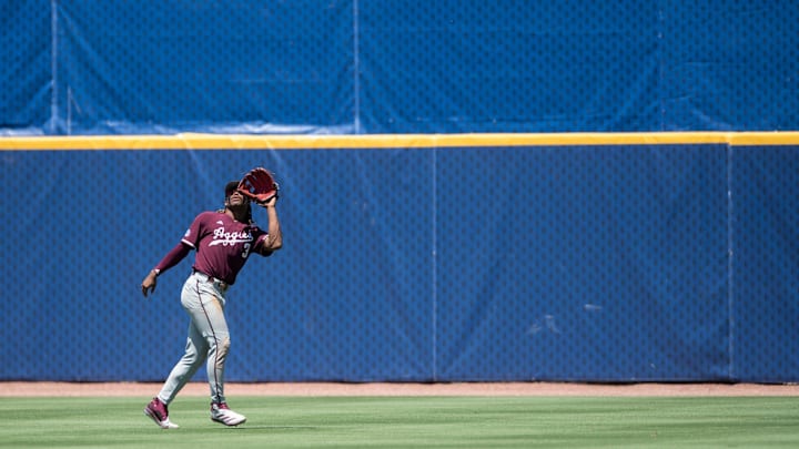 Texas A&M Aggies' Terrence Kiel II (3) catches a fly ball as Auburn Tigers take on Texas A&M Aggies during the SEC baseball tournament at Hoover Met in Birmingham, Ala., on Thursday, May 22, 2025. Texas A&M Aggies defeated Auburn Tigers 3-2.