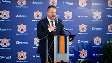 Auburn football head coach Alex Golesh speaks during his introductory press conference at Jordan-Hare Stadium in Auburn, Ala. on Monday, Dec. 1, 2025.