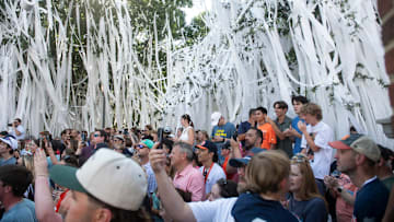 Fans watch on during the filming of the ESPN show Eli’s Places at Toomer’s Corner in Auburn, Ala. on Tuesday, July 8, 2025.