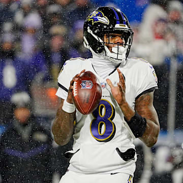 Baltimore Ravens quarterback Lamar Jackson gets ready to launch the ball during first half action at the Buffalo Bills divisional game against the Baltimore Ravens at Highmark Stadium in Orchard Park on Jan. 19, 2025.