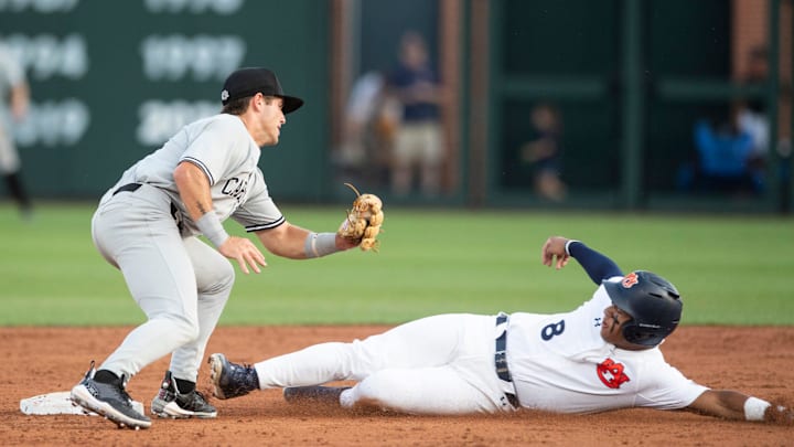 Auburn Tigers' Eric Guevara (8) slides safely into second base beating the tag from South Carolina Gamecocks' Henry Kaczmar (7) as the Auburn Tigers take on South Carolina Gamecocks at Plainsman Park in Auburn, Ala., on Thursday, May 8, 2025. Auburn Tigers' Eric Guevara (8) slides safely into second base beating the tag from South Carolina Gamecocks' Henry Kaczmar (7) as the Auburn Tigers take on South Carolina Gamecocks at Plainsman Park in Auburn, Ala., on Thursday, May 8, 2025.
