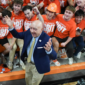 Clemson Tigers student fans welcome ESPN commentator Dick Vitale before the game against the Duke Blue Devils