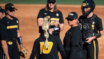 Missouri Tigers head coach Larissa Anderson huddles with her team as Florida Gators and Missouri Tigers face off in the SEC softball tournament championship game at Jane B. Moore Field in Auburn, Ala., on Saturday, May 11, 2024.