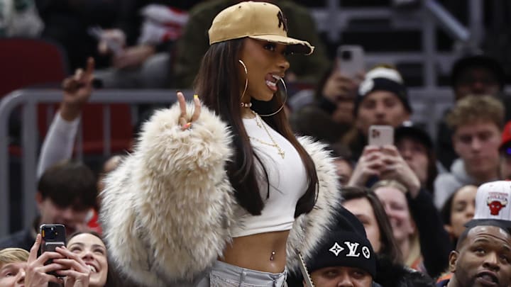 Megan Thee Stallion attends a basketball game between the Chicago Bulls and Boston Celtics during the second half at United Center.