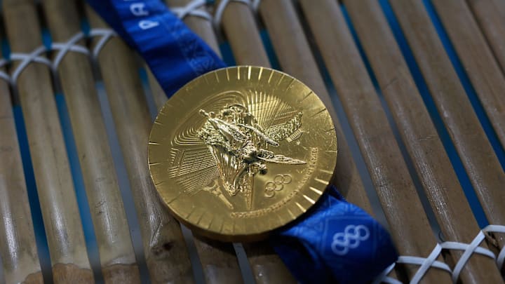 A gold medal from the 2024 Paris Olympics is displayed during a media tour.