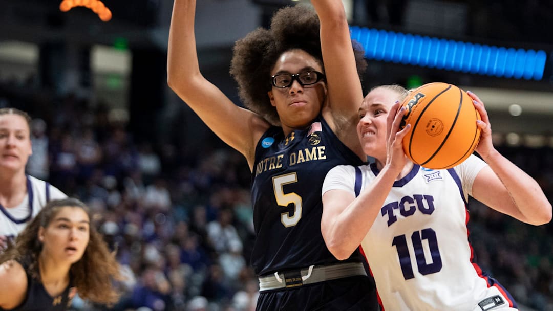 TCU Horned Frogs guard Hailey Van Lith (10) drives the ball on Notre Dame Fighting Irish guard Olivia Miles (5) as TCU Horned Frogs face off with Notre Dame Fighting Irish during the Sweet 16 at Legacy Arena in Birmingham, Ala., on Saturday, March 29, 2025. TCU Horned Frogs guard Hailey Van Lith (10) drives the ball on Notre Dame Fighting Irish guard Olivia Miles (5) as TCU Horned Frogs face off with Notre Dame Fighting Irish during the Sweet 16 at Legacy Arena in Birmingham, Ala., on Saturday, March 29, 2025.