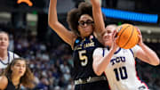 TCU Horned Frogs guard Hailey Van Lith (10) drives the ball on Notre Dame Fighting Irish guard Olivia Miles (5) as TCU Horned Frogs face off with Notre Dame Fighting Irish during the Sweet 16 at Legacy Arena in Birmingham, Ala., on Saturday, March 29, 2025.