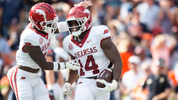 Arkansas Razorbacks linebacker Stephen Dix Jr. (14) celebrates his fumble recovery as Auburn Tigers take on Arkansas Razorbacks at Jordan-Hare Stadium in Auburn, Ala., on Saturday, Sept. 21, 2024. Arkansas Razorbacks lead Auburn Tigers 7-0 at halftime.