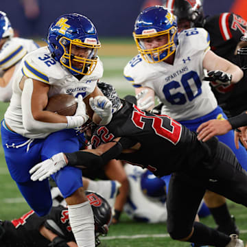 Port Jervis linebacker Ben Rivera (22) goes for a tackle against Maine-Endwell in the NYSPHSAA Class B championship game last year.