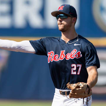 Ole Miss Rebels' Judd Utermark (27) throws the ball to first base as Arkansas Razorbacks take on Ole Miss Rebels during the SEC baseball tournament at Hoover Met in Birmingham, Ala., on Friday, May 23, 2025.
