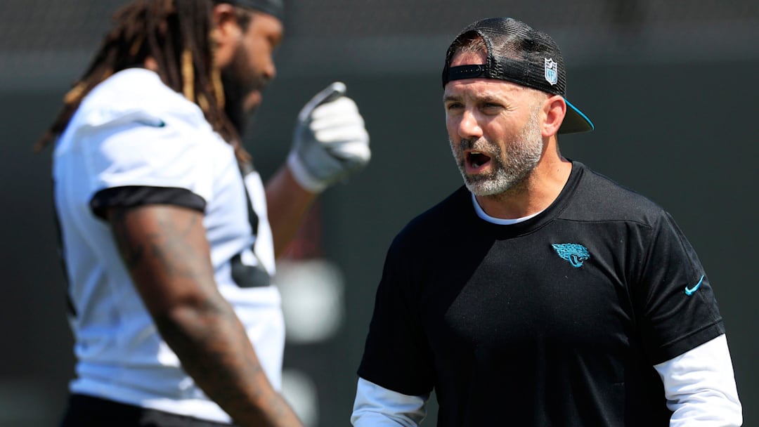 Jacksonville Jaguars outside linebackers coach Bill Shuey coaches defensive end Andre Carter (97) during an organized team activity Tuesday, May 28, 2024 at EverBank Stadium’s Miller Electric Center in Jacksonville, Fla.