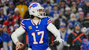 Buffalo Bills quarterback Josh Allen, ready to throw a pass, watches his receiver get into a position during first half action at the Buffalo Bills divisional game against the Baltimore Ravens at Highmark Stadium in Orchard Park on Jan. 19, 2025.